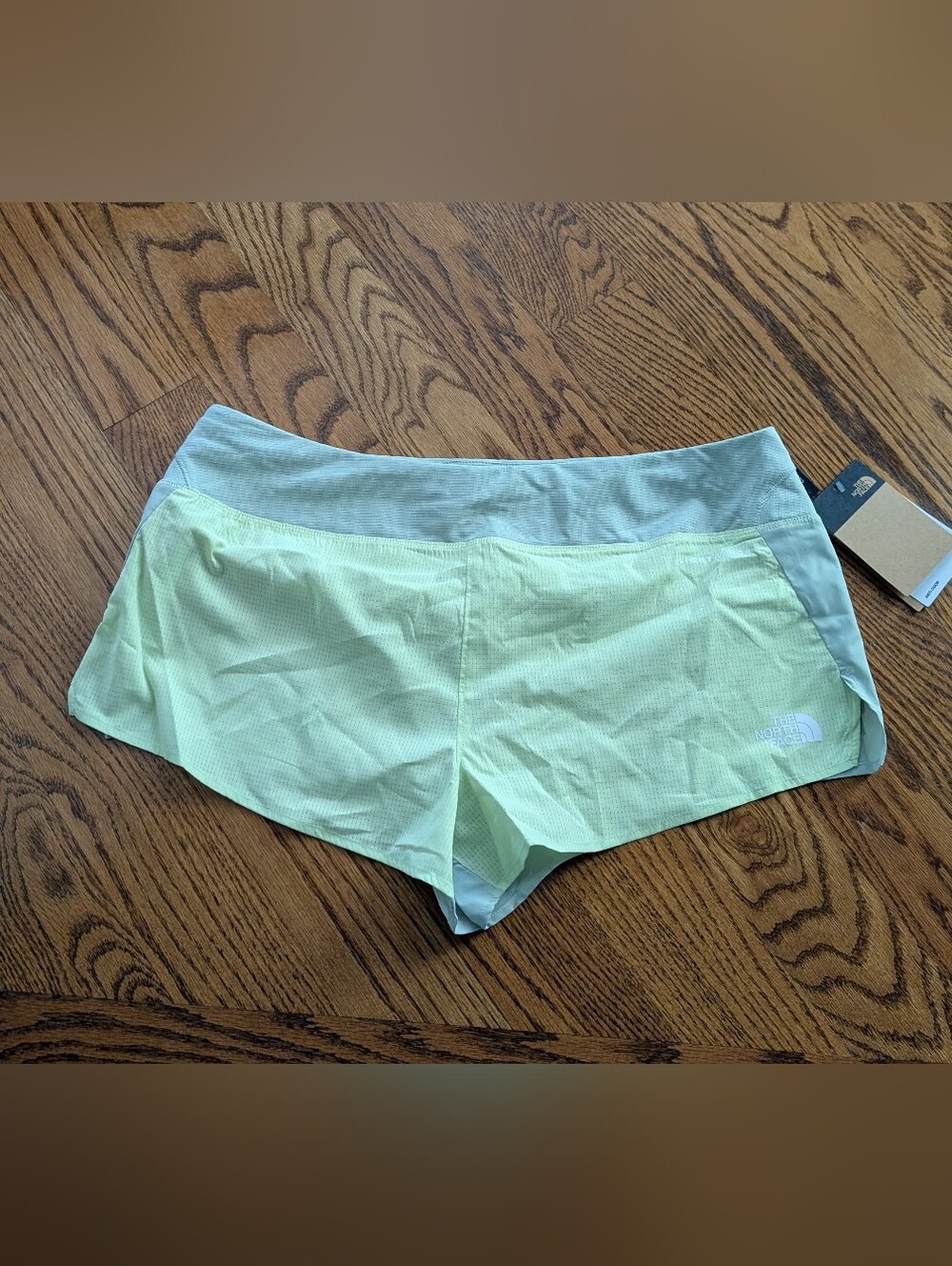 The North Face Women's Light Green Running Shorts with Wide Waistband